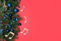 Flat lay composition with fir tree, Christmas decor and wooden music notes on color background. Royalty Free Stock Photo