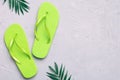 Flat lay composition with flip flops and seashell on colored background. Space for text top view Royalty Free Stock Photo