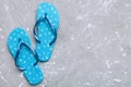 Flat lay composition with flip flops and seashell on colored background. Space for text top view Royalty Free Stock Photo