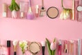 Flat lay composition with flowers and different beauty accessories on color background