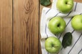 Flat lay composition of fresh ripe green apples on wooden background Royalty Free Stock Photo