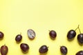 Flat lay composition with fresh ripe juicy grapes on yellow background Royalty Free Stock Photo