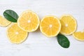 Flat lay composition with fresh ripe lemons on wooden table Royalty Free Stock Photo