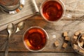 Flat lay composition with glass cups of black tea