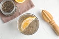 Flat lay composition with glass of water and chia seeds Royalty Free Stock Photo