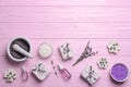 Flat lay composition with hand made soap  and lavender flowers on pink wooden table, space for text Royalty Free Stock Photo