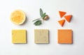 Flat lay composition with handmade soap bars and ingredients