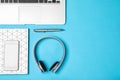 Flat lay composition with headphones, laptop and space for text Royalty Free Stock Photo