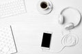 Flat lay composition with headphones, smartphone, computer keyboard and space for text Royalty Free Stock Photo