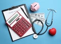 Flat lay composition with health insurance form, calculator and stethoscope Royalty Free Stock Photo