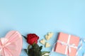 Flat lay composition with heart shaped chocolate candies on light blue background, space for text. Valentine`s day celebration Royalty Free Stock Photo