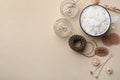 Flat lay composition with homemade candles ingredients on beige background, space for text Royalty Free Stock Photo