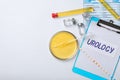 ÃÂ¡omposition with laboratory equipment and urine samples on light background. Urology concept