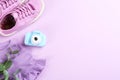 Flat lay composition with little photographer`s toy camera on background. Space for text Royalty Free Stock Photo