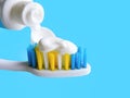 Flat lay composition with manual toothbrushes on blue background.Toothbrush and toothpaste.top view, Royalty Free Stock Photo