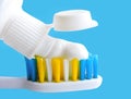 Flat lay composition with manual toothbrushes on blue background.Toothbrush and toothpaste.top view, Royalty Free Stock Photo