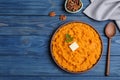 Flat lay composition with mashed sweet potatoes on wooden background Royalty Free Stock Photo