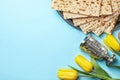 Flat lay composition with matzo and space for text on color background. Royalty Free Stock Photo
