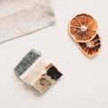 Flat lay composition with natural handmade soap and ingredients. Beautiful spa composition on a table top view.