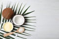 Flat lay composition with natural organic coconut oil on wooden background Royalty Free Stock Photo