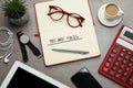 Flat lay composition with notebook on grey table. Tips and Tricks Royalty Free Stock Photo
