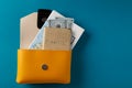 Flat lay composition objects for travel on a blue background.