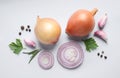 Flat lay composition with onions and spices on background Royalty Free Stock Photo
