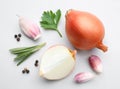 Flat lay composition with onions and spices on background Royalty Free Stock Photo
