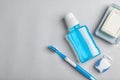 Flat lay composition with oral care products and space for text on light background Royalty Free Stock Photo