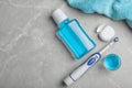 Flat lay composition with oral care products and space for text on light background Royalty Free Stock Photo