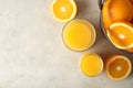 Flat lay composition with orange juice, fresh fruit on color background Royalty Free Stock Photo