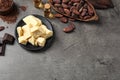 Flat lay composition with organic cocoa butter on table. Space for text Royalty Free Stock Photo