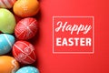 Flat lay composition of painted eggs and text Happy Easter Royalty Free Stock Photo