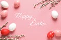 Flat lay composition of painted eggs and text Happy Easter Royalty Free Stock Photo