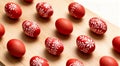 Flat lay composition with painted red Easter eggs on wooden table, space for text Royalty Free Stock Photo
