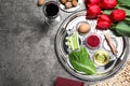 Flat lay composition with Passover Seder plate keara on grey table, space for text. Pesah celebration Royalty Free Stock Photo