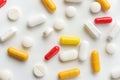 Flat lay composition with pills and capsules on a white background Royalty Free Stock Photo