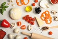 Flat lay composition pizza dough and fresh ingredients