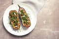 Flat lay composition with plate of stuffed eggplants Royalty Free Stock Photo