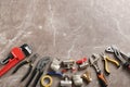 Flat lay composition with plumber`s tools and space for text Royalty Free Stock Photo