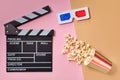 Flat lay composition with popcorn and space for text on color background Royalty Free Stock Photo