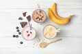 Flat lay composition with protein shakes and ingredients Royalty Free Stock Photo