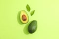 Flat lay composition with ripe avocados on white background, space for text Royalty Free Stock Photo