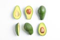 Flat lay composition with ripe avocados on white background, space for text Royalty Free Stock Photo