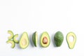 Flat lay composition with ripe avocados on white background, space for text Royalty Free Stock Photo