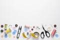 Flat lay composition with scissors and sewing supplies on white background. Space Royalty Free Stock Photo