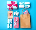 Flat lay composition with shopping bag and gifts