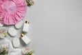 Flat lay composition with shower cap and spa stones on grey background. Space for text Royalty Free Stock Photo