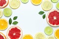 Flat lay composition with slices of fresh lemon orange grapefruit lime green leaves on white background top view copy Royalty Free Stock Photo