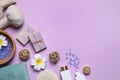 Flat lay composition with spa items on violet background. Space for text Royalty Free Stock Photo